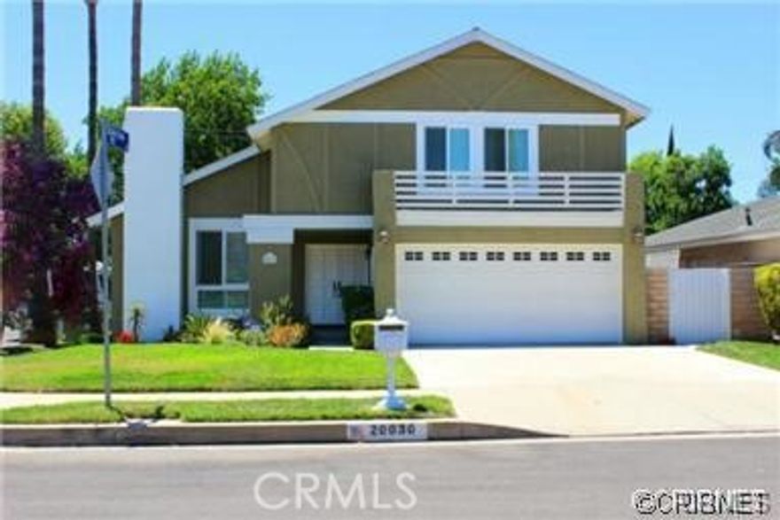 Welcome to this beautiful home, perfectly situated on one of the most desirable cul-de-sac streets in the area. With a spacious, light-filled floor plan designed for both entertaining and comfortable family living, this home offers the perfect blend of elegance and functionality.

Freshly painted interior and a covered patio enhance the overall appeal and comfort. From the moment you enter, you're greeted by a sophisticated Travertine foyer, soaring vaulted ceilings, and a spacious living room adorned with rich oak flooring. A striking Travertine fireplace adds warmth and charm to the living space.The home features 4 generously sized bedrooms and 3 bathrooms. The romantic master suite boasts a high ceiling, dual sliding-door closets, a ceiling fan, and a bathroom featuring granite surfaces, a frameless glass shower, and a luxurious soaking tub. One additional bedroom also includes a ceiling fan, and the other bedrooms offer walk-in closets. Brand new carpet upstairs. The guest bathroom features Typhoon granite, a modern vessel sink, and porcelain linen tile.The gourmet kitchen boasts granite countertops, wood cabinetry, stainless steel appliances, a side-by-side refrigerator/freezer, double sinks, a new built-in microwave, and an beverage bar. A cozy breakfast area overlooks the sparkling pool and spa, making it the perfect spot to start your day. The wrought iron staircase leads to four well-appointed bedrooms upstairs. Additional amenities include a brand new roof, an indoor laundry room with washer/dryer and storage cabinetry, and a 2-car attached garage with direct access to the kitchen. Very close to a shopping center, movie theatre, and trendy restaurants.
