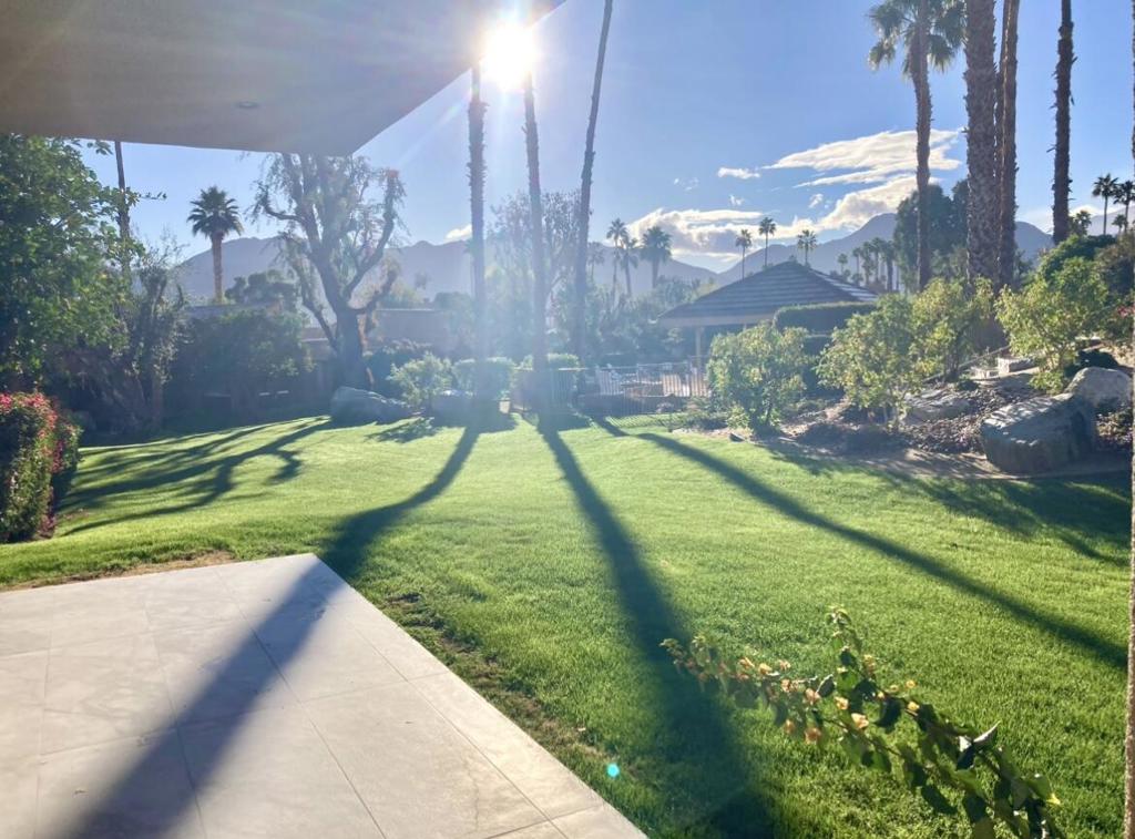 * IRONWOOD, prestigious location in South Palm Desert, close to the McCallum theater, El Paseo, and next to Living Desert*Elevated position boasting both Mt. Eisenhower & Oasis like water view through a huge opening to the East & South*Demolished and rebuilt in 2024 with an expanded living room space converting an atrium, newly built garage, a new gas line embedded under the ground two feet for outdoor BBQ, a front patio provides dynamic views of mountains, greenbelts, community pool & lush landscaping*Smart & sophisticated layout, and staged with high end mid century light fixtures and custom furniture*A very bright contemporary brand-new condo with beautiful citrus through every window