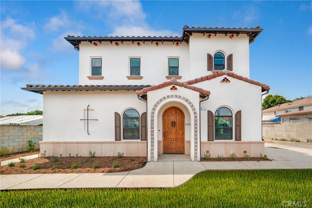 Welcome to 2709 Cogswell Rd, a stunning brand-new Spanish-style detached single-family home located in the heart of El Monte. This thoughtfully designed 4-bedroom, 4.5-bathroom residence features en-suite bathrooms in every bedroom, a spacious open-concept layout, and upgraded finishes throughout. The chef’s kitchen boasts quartz countertops, a full designer water-splash backsplash, and premium cabinetry, flowing seamlessly into light-filled living and dining areas with high ceilings. Enjoy modern comforts with upgraded flooring, recessed lighting, and energy-efficient systems, along with the convenience of a 2-car attached garage and additional guest parking. A private backyard provides the perfect outdoor retreat, while a low monthly HOA adds value without burden. Ideally situated near schools, shopping, and major freeways, this home combines timeless Spanish architecture with contemporary luxury in a prime location.