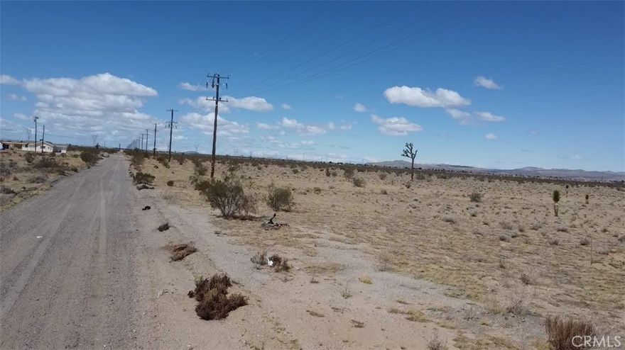 4-acre parcel located off road for ease of access to local transportation routes. All utilities are nearby. The High Desert continues to demand additional housing with major development projects including Brightline West’s High-Speed Rail and the Barstow International Gateway (BIG). With stops in Apple Valley and Hesperia, the High-Speed Rail will travel a route of 218 miles and reach top speeds of 186 mph. The project will bring an estimated 10,000 jobs to the area throughout it’s development and is under construction in Las Vegas, full service expected by December 2028. The rail will enhance connectivity between the High Desert, Las Vegas, and the greater Los Angeles area. Barstow is nearing completion of their General Plan Update to welcome BIG, a state-of-the-art intermodal distribution facility run by BNSF Railroad. Spanning 4,500 acres and bringing an investment of $1.5 billion dollars, BIG aims to relieve the Ports of Los Angeles and Long Beach by importing freight directly from ship to rail, where it will be received and broken down for regional and domestic distribution. This forthcoming project will maximize supply change and bring an estimated 20,000 jobs to the Barstow area. Buyer to verify all information contained herein. Agent and their representatives are not responsible for the accuracy of these claims.