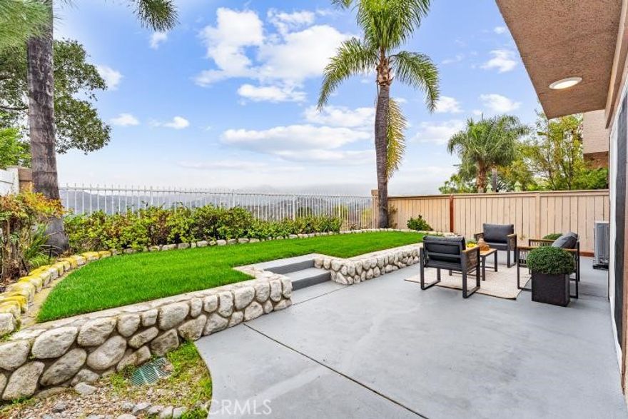 Turnkey townhome with  sweeping panoramic views of Saddleback Mountain and Oneill Park, and rare private backyard!

Welcome to 19 Vista Barranca #75, Rancho Santa Margarita—a beautifully upgraded and move-in ready end-unit townhome in the sought-after Vista La Cuesta community. With just one attached neighbor, this residence offers the privacy and feel of a single-family home.

Featuring 2 bedrooms + loft, 2.5 baths, and approx. 1,291 sq ft, this home has been thoughtfully renovated throughout. The light-filled main level showcases a modern kitchen with updated cabinetry, Quartz  countertops, and stainless steel appliances, a spacious living room with fireplace, and a formal dining area that opens seamlessly to the outdoors.

Step outside to enjoy the generously sized backyard—a rare find in this community—perfect for entertaining, gardening, or simply taking in the tranquil mountain and park views.

Upstairs, the versatile loft offers space for a home office or playroom, while both bedrooms feature upgraded baths and plenty of storage.

Additional highlights include : Inside Laundry room, New Central Heat & Ac include new ducting, Repiping, New Water Heater, Tasteful designer finishes throughout.

Community amenities include a pool, spa, clubhouse, tennis, pickleball, trails, playground, and BBQ areas, plus access to RSM Lake and Beach Club just across the way. With its turnkey upgrades, spacious private yard, and end-unit privacy, this home is a standout opportunity in Rancho Santa Margarita.