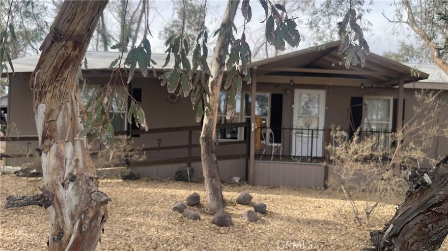 The property is showing on title as a Ofc & Res with Land Use as Office & Residential.  It shows 2 buildings.  The property appears to be a mobile and does not show on title as permanent.  Title shows it to have 1296 sq ft with 3 bedrooms built in 1970.  Financing will likely be difficult.