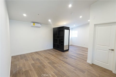 Photo of 2821 8th 1/2 Avenue, Los Angeles, CA 90018 (MLS # SR26219713)