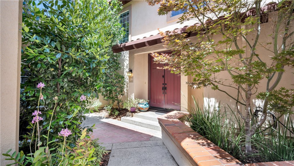 Updated and thoughtfully designed, 39 Pasto Rico is a stylish condo situated in the highly desirable Serabrisa community of Rancho Santa Margarita. This 2-bedroom, 2.5-bath home offers a harmonious blend of modern upgrades, functional layout, and peaceful surroundings in one of South Orange County’s most sought-after neighborhoods. Step inside to a light-filled open-concept living space featuring luxury vinyl plank flooring and a cozy fireplace that creates an inviting atmosphere. The kitchen impresses with quartz countertops, stainless steel appliances, sleek cabinetry, and a functional breakfast bar.
Upstairs, you'll find two spacious primary suites, each offering its private en-suite bathroom. The larger suite includes dual sinks, a soaking tub with a shower, and built-in closet organizers. The secondary suite features custom tile and a generous vanity. A stylish half-bath on the main level adds convenience for guests. Enjoy indoor-outdoor living with a private enclosed patio, perfect for entertaining or unwinding with views of the adjacent Tijeras Creek Golf Course, as well as lush greenbelt surroundings. Additional upgrades include new PEX plumbing throughout the community, an energy-efficient Trane HVAC system, double-pane windows upstairs, in-garage laundry hookups, built-in storage, attic space, and an additional assigned parking spot.
Residents of Serabrisa enjoy exclusive access to a resort-style pool and spa and are within walking distance of Arroyo Vista K-8 School, scenic hiking trails, and beautifully maintained parks. The home also includes membership to SAMLARC, granting private access to the Lago Santa Margarita Beach Club, where residents can enjoy the lagoon-style lake, clubhouse, and a variety of community events year-round. Just minutes from upscale dining, shopping, and endless outdoor recreation - 39 Pasto Rico offers the best of low-maintenance luxury living in a vibrant and welcoming community.