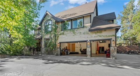 Photo of 1034 Teakwood Dr, Lake Arrowhead, CA 92352 (MLS # IG26049386)