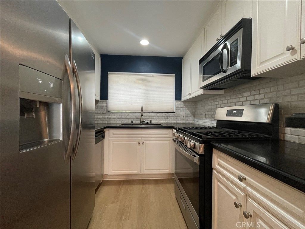 Photo of 21520 Burbank Boulevard #116, Woodland Hills, CA 91367 (MLS # SR25136459)