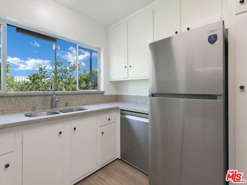 Photo of 3166 S Sepulveda Boulevard #22, Los Angeles, CA 90034 (MLS # 26844097)