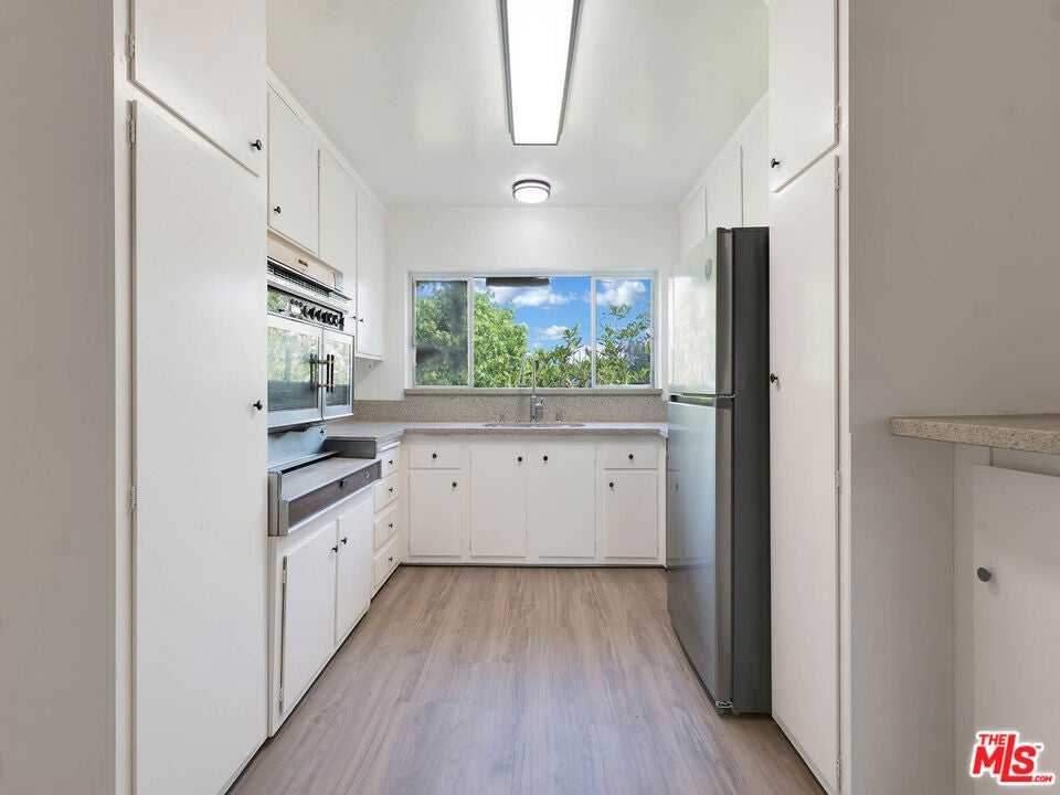 Photo of 3166 S Sepulveda Boulevard #22, Los Angeles, CA 90034 (MLS # 26844097)