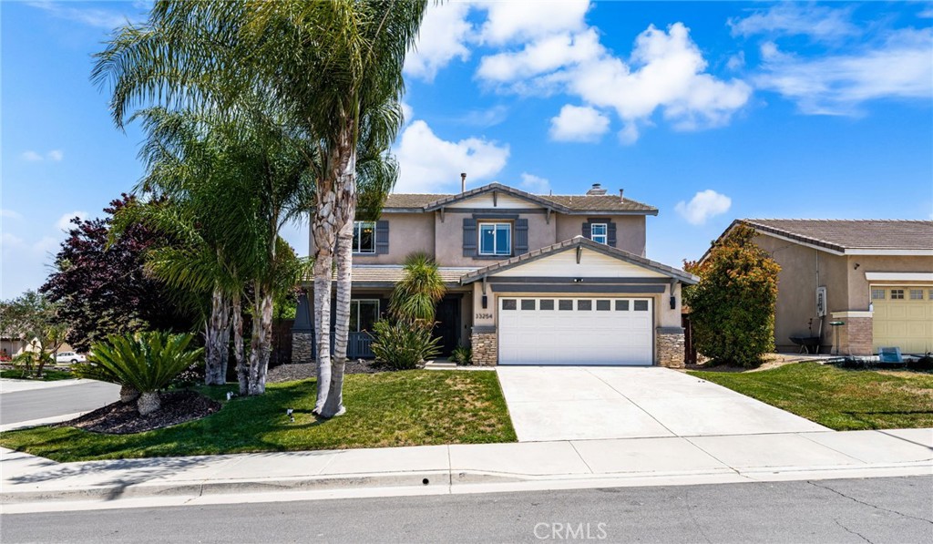 Welcome to your dream home nestled in a premier neighborhood on the border of Murrieta! This charming residence boasts a stunning blend of modern updates and cozy farmhouse appeal, featuring 5 spacious bedrooms and 2.5 beautifully appointed bathrooms—perfect for families of all sizes. Step inside to discover an inviting space adorned with new engineered wood flooring and plush carpeting that exudes warmth and sophistication. The dining and family rooms are accentuated by stylish distressed wood walls, creating a unique and welcoming atmosphere. The heart of the home is the fully remodeled kitchen, showcasing elegant new countertops, a decorative tile listelle backsplash, and brand-new appliances—ideal for both everyday cooking and entertaining guests. The expansive family room is perfect for gatherings, complete with a cozy gas fireplace to enhance those chilly evenings. Ascend to the upper level where the luxurious master suite awaits, featuring an ensuite bathroom with a separate tub and shower for a spa-like escape. You’ll be delighted by the impressive walk-in master closet, equipped with a complete organization system to keep your wardrobe tidy and accessible. The additional bedrooms are generously sized, ensuring comfort and privacy for all family members. The secondary bathroom has also been thoughtfully remodeled, reflecting the home's overall elegant aesthetic. Plus, the large upstairs laundry room includes shelving and storage solutions to make chores a breeze. Step outside to a vast, pool-sized backyard—perfect for summer barbecues and family fun—complete with a covered patio for shade. Situated on a corner homesite, this property boasts a peaceful ambiance with a single-story home behind, enhancing your privacy. With low taxes and no HOA fees, this home offers exceptional value. Don’t miss your chance to make this stunning residence your forever home! Schedule a showing today and experience all it has to offer.