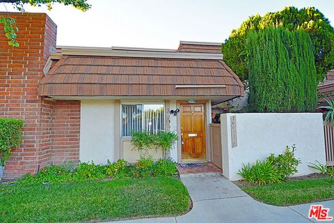 Photo of 10051 Valley Circle Boulevard #6, Chatsworth, CA 91311 (MLS # 26648913)