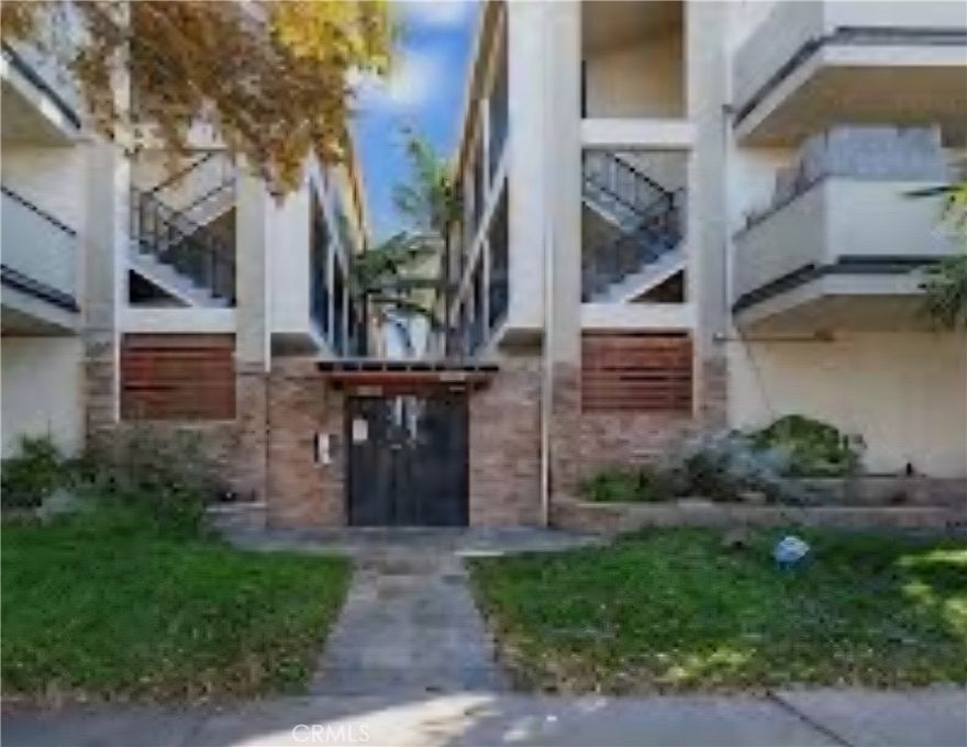 Second level condo in Temple Gardens gated community. Enter into the living room, then step into the kitchen with granite countertops, stainless steel sink, microwave, range, and refridgerator. Laminate and carpeted floors. Small patio off the kitchen. Ride your bike to the beach. Cal State Long Beach, Long Beach City College, Belmont Heights.  The 91 710, 22 and 405 freeways are close to the unit. Must see it to appreciate what this has to offer. Could be your next home.