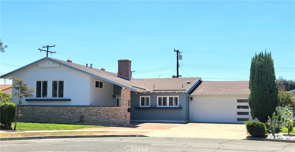 Nestled in a quiet cul-de-sac at 2408 E Briarvale Ave, Anaheim, this fully renovated 4-bedroom, 2.5-bathroom home offers modern comfort and convenience on a spacious 9,401 sq ft lot. Recent upgrades include a brand-new kitchen, new roof, new AC system, stylish new flooring, and fresh paint inside and out. The expansive backyard features a large patio, mature fruit trees, and ample space with potential for an ADU. A generously sized basement adds even more versatility—perfect for transforming into a custom entertainment suite, home theater, or game room. Ideally located near the 91 and 57 freeways, this home is just minutes from California State University, Fullerton, major shopping centers, Honda Center, Angel Stadium, and more, offering the perfect blend of tranquility and accessibility.