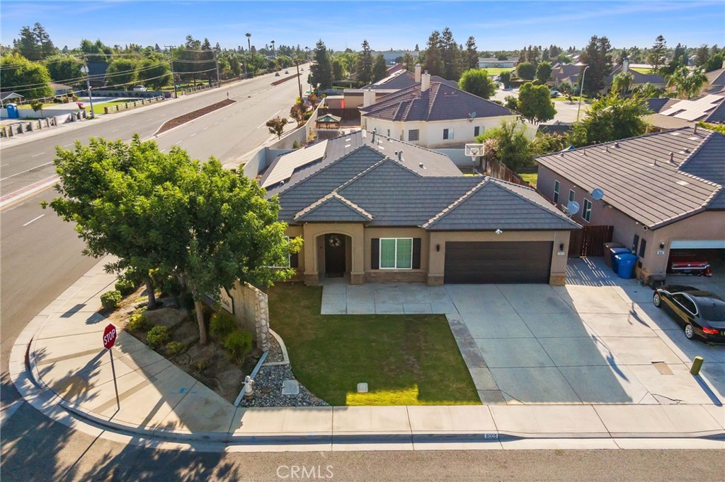 This beautifully maintained 4-bedroom, 2-bathroom ranch-style home blends open-concept living with an abundance of natural light, creating a warm and inviting atmosphere throughout. The spacious layout offers excellent flow between the living, dining, and kitchen areas—perfect for entertaining or relaxing with family.
The attached 2-car garage with full pass-through access is a rare find—ideal for car enthusiasts, weekend projects, or additional storage needs.
Set on a quiet, well-kept street, this residence is centrally located near highly regarded schools, shopping centers, restaurants, and major transportation routes, offering unbeatable convenience in a sought-after neighborhood.
Don’t miss your opportunity to own in one of Bakersfield’s premier communities. This home truly checks all the boxes!