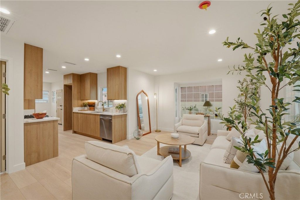 Photo of 1111 W 98th Street, Los Angeles, CA 90044 (MLS # DW26016981)