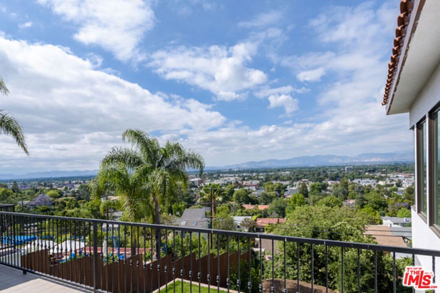 VIEWS! VIEWS! VIEWS! This house is just the right one for the modern renter! Newly renovated from the studs up, this 5 bedroom 5 1/2 bathroom home features an open and light filled floor plan with approximately 3,800 sq ft of living space. Finished with the finest touches throughout including recessed lighting, distressed hardwood floors and double pained windows. Upstairs features large living and dining rooms with views, private patio, kitchen with wet bar, guest bedroom and master suite. The kitchen has stainless steel appliances, center island, gorgeous countertops, butler's pantry and french doors that open to a second entry patio. Amazing master suite with birds eye views from every direction, fireplace, large walk-in closet with island, bathroom with deep soaking tub.