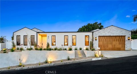 Photo of 831 Teakwood Road, Los Angeles, CA 90049 (MLS # SR26121677)