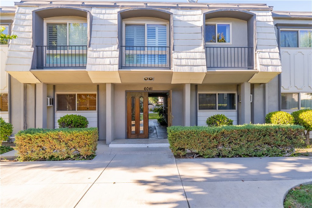 Why rent when you can own for nearly the same monthly cost? This desirable end unit is situated in one of the best locations within the entire community offering added privacy with no neighbors above and only one shared wall. Step inside and you’ll immediately notice the pride of ownership. The home features a stylish accent wall, a modernized kitchen, and was freshly painted just weeks ago. The inviting patio provides the perfect space for outdoor lounging or entertaining. Parking is convenient with a covered carport just steps from your door, and additional spaces are available if needed. While the HOA fee may appear high at first glance, it’s packed with value: water, trash, and even property taxes are included, annual in-unit maintenance and well-kept community grounds, access to two swimming pools, a playground and a basketball court. Located in one of the most sought-after areas of the San Fernando Valley at Warner Center, you're just minutes from the renowned Westfield Topanga Mall, Costco, a wide variety of restaurants, local markets, and Ventura Blvd. This is a rare opportunity to own in a vibrant, well-maintained community with unbeatable convenience. Don't miss out!