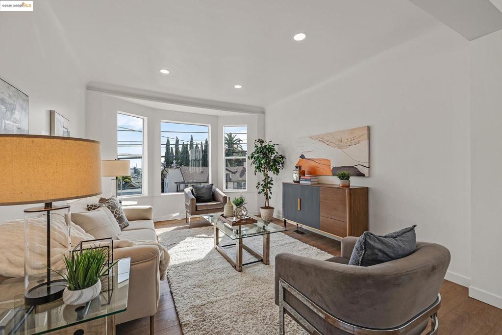 Don’t miss this opportunity! Situated on one of the largest lots in the neighborhood, 4730 Melrose offers stunning Bay views, modern upgrades, and incredible future potential. Whether you’re seeking a move-in-ready home or one with room to grow, this property delivers on both fronts. Flooded with natural light, the home features high ceilings and expansive windows that create a bright and airy atmosphere. The living room captures tranquil Bay views, an everyday luxury. The updated kitchen is a chef’s delight, boasting brand-new appliances, a striking quartzite island, and a sleek integrated backsplash. The bathroom has been thoughtfully renovated with high-end finishes that evoke a serene, spa-like feel. Additional highlights include a dedicated laundry room with hookups, an attached garage, and a wide driveway for added convenience. The large lot offers ample room for expansion or the addition of an ADU. Plus, sidewalk and sewer lateral compliance are already complete for peace of mind. Eligible buyers may also qualify for down payment assistance, making this home an even smarter investment. Schedule your showing today—this one won’t last!