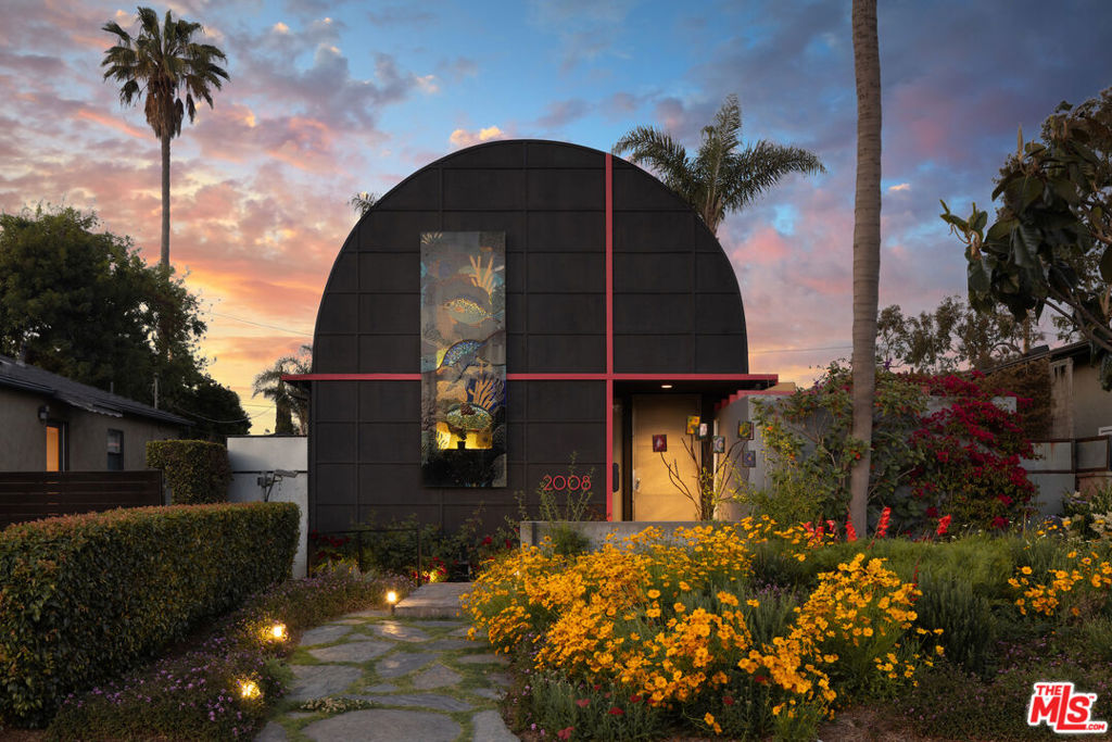 A Rare Architectural Gem in the Heart of Venice, 2008 Glencoe is both a serene sanctuary and a vibrant creative hub. Designed by renowned architect Steven Ehrlich for rock icon Perry Farrell, this one-of-a-kind residence fuses global influences with the soul of California modernism. A dramatic barrel-vaulted ceiling, expansive sliding glass walls, and flexible studio spaces create a dynamic interplay of bold geometry and seamless indoor-outdoor flow. At once sculptural and livable, the home offers an inspiring backdrop for both quiet retreat and effortless entertaining. Tucked into one of LA's most vibrant neighborhoods and complete with a rare three-car garage, this home is not merely a place to live, it's a bold statement of individuality and authentic creative expression.