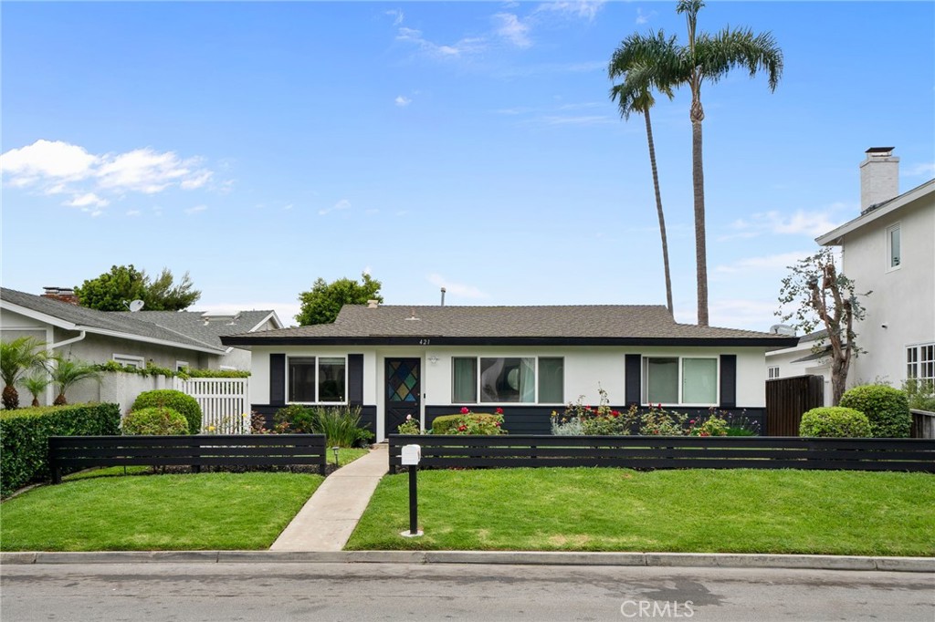 An exceptional opportunity on the highly coveted 400 block of Tustin Avenue in Newport Heights. This prime 6,375 sqft lot hosts a property poised for transformation, offering a discerning buyer the chance to craft their dream remodel or construct a bespoke residence. Enjoy an unparalleled coastal lifestyle with best-in-class restaurants, charming local boutiques, top-rated schools, vibrant neighborhood parks, and iconic beaches all within a short walk or bike ride. A rare chance to secure your place in one of coastal Orange County's most desirable communities.