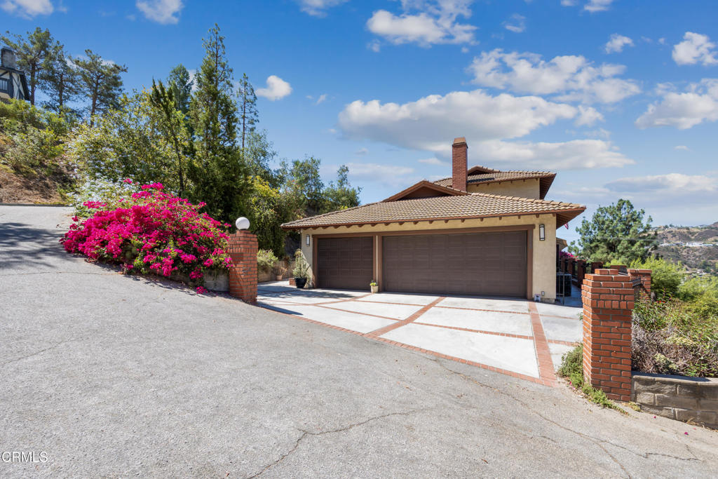 Hillside Living in Chevy Chase Canyon! Welcome to 3630 Figueroa St., a 4-bedroom, 3-bathroom retreat offering +/-3,512 sq ft of living space on a private 17,500 sq ft lot. Perfectly positioned to capture panoramic mountain, canyon, and city views, this home combines thoughtful updates with timeless design.The large open floorplan is filled with natural light, highlighted by oversized windows and two decorative fireplaces. A brand-new kitchen flows seamlessly into the dining and living areas, creating the perfect setting for everyday comfort and entertaining. The massive primary suite offers a spa-like new bath, a spacious walk-in closet, and private balcony access. A main-floor bedroom adds flexibility for guests or a home office.With a newer roof, upgraded plumbing and electrical, a 3-car garage, and three balconies, this home delivers both style and function. Ideally located near La Canada Flintridge, Chevy Chase Country Club, hiking trails, and the Rose Bowl, this is hillside living at its finest.