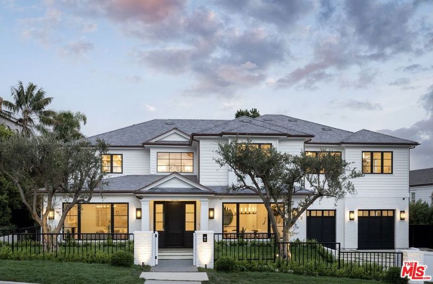 Welcome to the Spoleto Estate, a meticulously crafted East Coast Traditional in Prime Riviera. As you enter the residence, two-story entry with vaulted wood-paneled ceilings invites you into a spacious formal living room with a fireplace and adjacent office. An expansive formal dining room showcases coffered ceilings and a butlers pantry. The family room features built-in cabinets, a marble fireplace and warm wood-paneled ceilings. Disappearing pocket doors opens to a patio with fireplace, providing a perfect indoor-outdoor flow. An open floor plan leads to the gourmet kitchen with breakfast area and island, making this room the perfect entertaining space. Lastly, a guest suite with french doors that lead out to the backyard to create a moment by the pool. The upper level includes a luxurious master suite with fireplace featuring dual walk-in closets, a wet bar and en-suite bathroom with a steam shower. Additionally there are 3 large bedrooms and a connecting family room. At the lower level, you will be immersed with a large family room with bar, wine cellar, gym, media room, as well as a guest suite. Situated on approximately 16,558 sqft, the rear yard offers a pool, spa, built-in BBQ, pizza oven, and park-like feel with lush landscaping. With privacy and elegant detail, this is the perfect home for entertaining and effortless living.