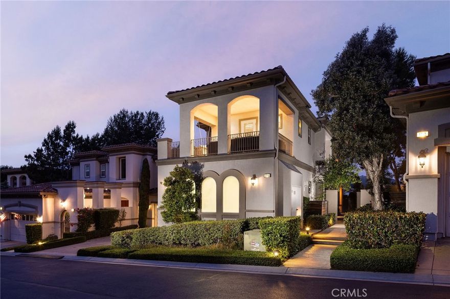 Located within the Sea Villas at Monarch Beach, an intimate collection of just 18 luxury residences adjacent to the Waldorf-Astoria Resort with exclusive member privileges, this property elevates coastal living to an art form. Perched above the Monarch Beach Golf Links, fairway and ocean breezes are your backdrop to an extraordinary lifestyle. Arrive to a deep two-car attached garage with high ceilings and ample guest parking nearby. Grand double doors reveal a dramatic two-story foyer, where graceful curving stairs beckon to private quarters above. With interior proportions spanning 3,282 sq ft, the home includes comfortable accomodations of 4 bedrooms and 4.5 baths, including a main-level suite. Priceless golf course views frame open living areas that flow effortlessly onto patios through vast bi-fold doors. The family room features a fireplace with built-ins and a single piece, solid wood mantle. The chef's kitchen showcases exceptional craftsmanship with top appliances, bar seating, and seamless access to the indoor-outdoor entertaining spaces. Additional conveniences include a butler’s pantry with wine fridge, dedicated laundry, zoned HVAC with remote operation, and Sonos audio systems inside and out. Upstairs, a loft area with built-in desk provides a versatile workspace or retreat. The primary suite hosts a private fireplace and balcony overlooking the golf course, built-ins with refrigerator drawers, blackout shades, and a custom walk-in closet with secure bolted safe. Its spa-inspired bath invites relaxation with a decadent soaking tub and shower. An ocean-view balcony is located off one of two additional upstairs bedrooms, each tucked privately down the hall with designer finishes, lighting, and ensuite baths. Designed for effortless entertaining, the home’s outdoor areas are highlighted by patios with a fire table, built-in BBQ with bar seating, surround sound, and sweeping golf course views. As a Waldorf Astoria member, access exclusive resort amenities including the members-only lounge, fitness center, pools, preferential pricing for dining and spa treatments, and shuttle service to the beach and concerts. This is the pinnacle of coastal sophistication and championship golf living in one of Orange County's most coveted addresses.