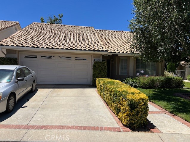 Tivioli Plan 200 on quiet street - upgraded cabinets in kitchen, granite counters & garden window - laminate flooring - alumawood patio cover - den has built-in desk and bookcases - mirrored closet doors in master - master bath shower upgraded - plus all the benefits of Sun Lakes Country Club an
active adult retirement community for 55+. There are two private golf courses, tennis, bocce ball, 3 clubhouses, full service restaurant, lounge,
and clubs galore.