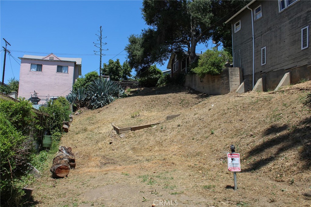 Location, Location, Location!
Take advantage of this amazing opportunity to build your dream home or invest in a prime piece of land. This well-sized lot offers flexibility—build a custom single-family residence or a duplex and generate potential rental income from the second unit.
Perfectly located for new and growing families, this lot is just minutes from York Blvd., known for its vibrant local shops, dining, and entertainment. Supermarkets and major shopping centers are within 2 miles for added convenience.
Families will appreciate the close proximity to the highly regarded Benjamin Franklin High School—just 6 minutes away. Easy access to the 110, 5, and 2 freeways make commuting a breeze, placing you minutes from everything Los Angeles has to offer.
Don’t miss this incredible chance to own land in one of LA’s most desirable and connected neighborhoods. Seller is very motivated and may carry. Buyers and their agents are encouraged to perform due diligence regarding square footage, utilities, and other property details. Seller is very motivated and may carry. Go Direct!