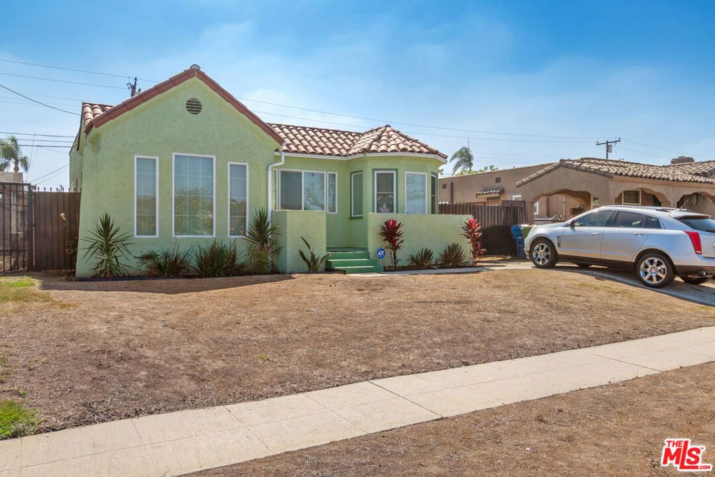 Photo of 1424 W 94th Place, Los Angeles, CA 90047 (MLS # 25613175)
