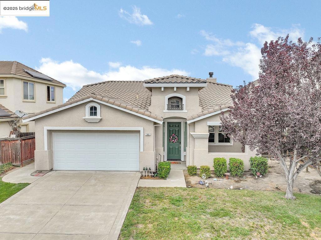 Best value in Deer Ridge-This is the single story in the prestigious Deer Ridge community that you have been waiting for! This home features a delightful front porch, inviting living room and dining room. The entertainers kitchen includes granite counters, breakfast bar, new kitchen appliances, gas stove, and access to the rear yard. Step down the hall to the spacious bedrooms with updated carpet, updated guest bath with gorgeous quartz modern dual square sinks, and new tile flooring. The laundry room has new matching sleek modern tile. The primary suite features a spacious room, walk-in closet, tub, stall shower, tile flooring, new modern quartz dual sink countertop with square sinks, and slider access to rear patio. The bonus features include new energy efficient multi-speed HVAC system, Levelor heat reflecting/darkening window coverings, new interior paint, new bath faucets, Google Nest smart thermostat, Ring camera, newer water heater, updated "water resistant" durable laminate flooring, recessed lighting, kitchen desk, oak cabinetry, and added attic access. This home is move-in ready! There are no homes behind this property, patio is installed in the rear yard, some grass is to the side of the house which will make a perfect play area or dog run. This one won't last!