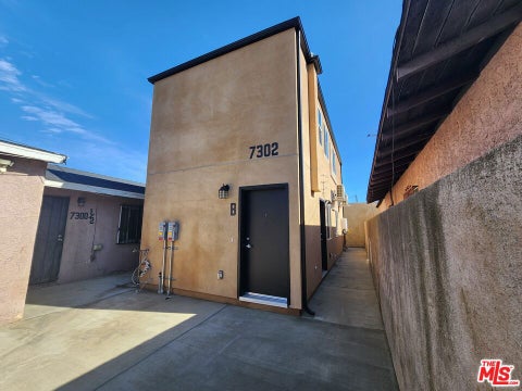 Photo of 7302 Mace Place #B, Los Angeles, CA 90001 (MLS # 26102109)