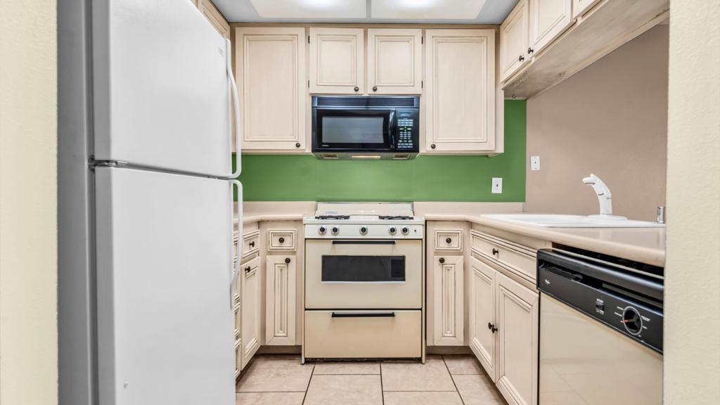 FEE SIMPLE YOU OWN THE LAND! This charming 2-bedroom, 1.5-bath two-story condo is tucked away in the peaceful, gated community of Lakeview Villas. Enjoy beautiful lake views from your private patio, perfect for morning coffee or relaxing evenings.Step inside to a bright and functional layout featuring two spacious bedrooms with generous closet space. The kitchen offers ample storage, and the open living area flows seamlessly to your outdoor retreat.Located in one of Cathedral City's most convenient spots, you're just minutes from Sprouts, ALDI, Walmart, shopping centers, gas stations, and Palm Springs Airport. The HOA covers water, trash, roof, and landscaping, offering truly low-maintenance living.Whether you're looking for a full-time home, vacation getaway, or investment property, this move-in ready condo checks all the boxes. Don't miss it!