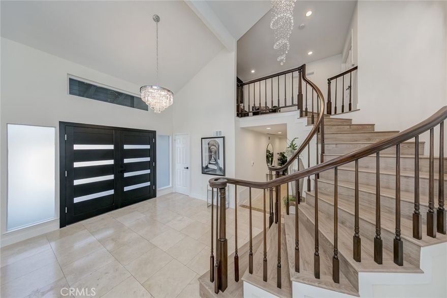 An Amazing Luxury Cottage Estate in a Established Neighborhood of Fullerton! Built in 1981, Freshly Remodeled in 2025! 4 Bed + OFFICE, 4 Baths home with 1 Bed and 1 Full Bath Downstairs + office space in the garage! 3 Car Garage (1 space is converted to office) and Spacious Driveway! Get ready to be impressed!  Over 3,000 sq.ft of High Cathedral Ceiling - Sunken Living Space & Over 10,300 sq.ft of Private Land! This Beauty has been recently Remodeled with Touch of Magic!  Newer Windows, Newer High-End Kitchen, Newer Baths, Newer Recessed Lightings, Newer Chandeliers, Newer Floorings, Spacious Wooden Patio, Newer garage doors, and much more. It's One of a Kind!  Parks and Walking Trails all around! Assigned schools are, Laguna Road Elementary, Robert C Fisler and Sunny Hills High School!  Luxury Settings, Elegant, and move-in ready - Simply the Best!