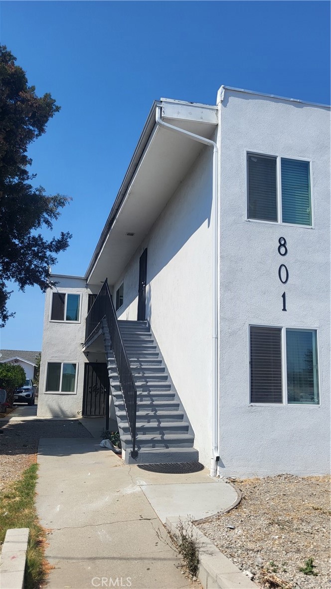 Positioned on a high-visibility corner in a walkable neighborhood, this four-unit building presents a compelling opportunity for investors seeking stability, upside potential, and minimal immediate maintenance. With key capital improvements already completed—including **new dual-pane windows (2023)** and a **new roof (2024)**—the property is well-positioned for long-term performance.
Two of the units have been upgraded with **newer furnaces** and **tankless water heaters**, reducing future replacement costs and enhancing tenant satisfaction. Each unit is notably **light and spacious**, contributing to tenant retention and consistent occupancy.
The property includes **four off-street parking spaces**, a valuable amenity in this area, and is located within walking distance of both an **elementary school** and **local shopping**, making it attractive to a broad tenant base. All appliances are tenant-owned, with the exception of Unit 4, minimizing owner responsibility for replacements.
**Importantly, the building falls under **Los Angeles City Rent Control (RSO)** guidelines, offering predictable regulatory parameters for long-term planning.This is a turn-key asset with strong fundamentals—ideal for investors looking to hold and benefit from steady cash flow, future appreciation, and a location that supports consistent demand