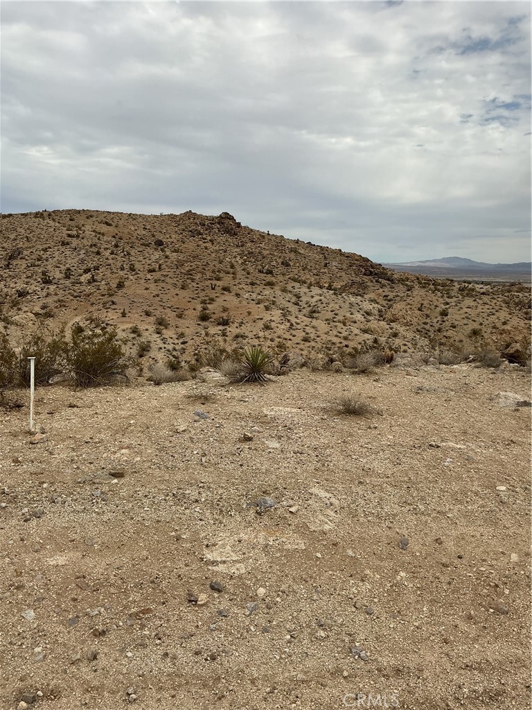 Imagine owning your very own piece of desert land in the highly desirable land Tract area of Lucerne Valley! Very close too Apple Valley. Build you own Ranch in a big land 30 Acres, you can build your dream home right here. It's just a short drive to the heart of town. Plus, you'll wake up every morning to stunning views of the mountains. This is your chance to make your dreams come true! Don't wait too long though, because this land won't stay available for long. Act now and start living your best life in Lucerne Valley's beautiful Tract area! There is currently homes around the on the property. The propert