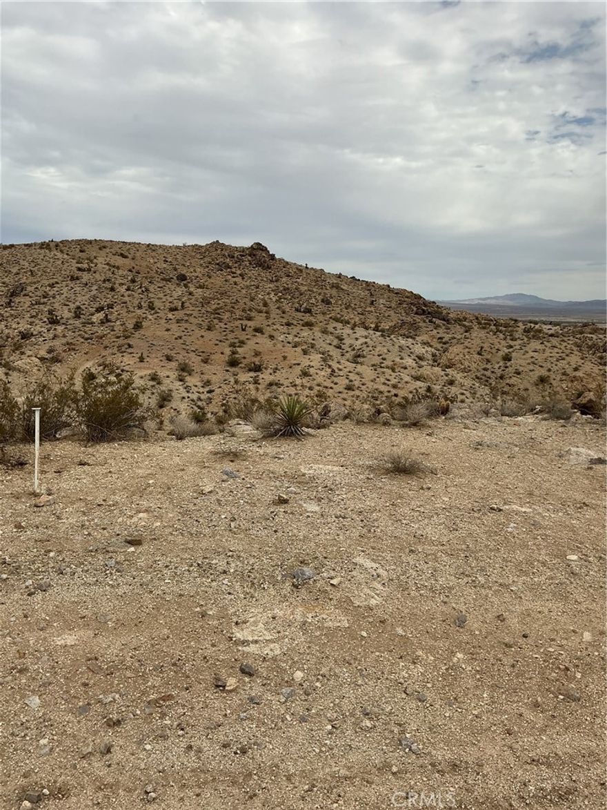Imagine owning your very own piece of desert land in the highly desirable land Tract area of Lucerne Valley! Very close too Apple Valley. Build you own Ranch in a big land 30 Acres, you can build your dream home right here. It's just a short drive to the heart of town. Plus, you'll wake up every morning to stunning views of the mountains. This is your chance to make your dreams come true! Don't wait too long though, because this land won't stay available for long. Act now and start living your best life in Lucerne Valley's beautiful Tract area! There is currently homes around the on the property. The propert