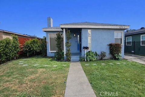 Photo of 16218 S Caress Ave, Compton, CA 90221 (MLS # DW26035513)