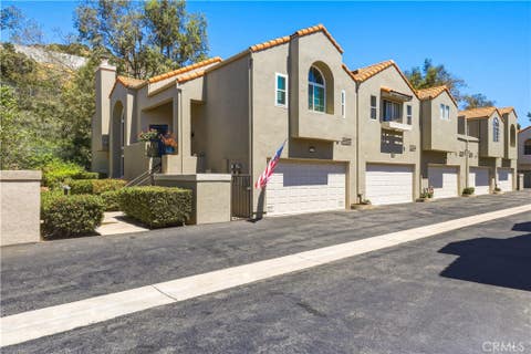 Photo of 22229 Shadow Valley CIR, Los Angeles, CA 91311 (MLS # SR26177230)
