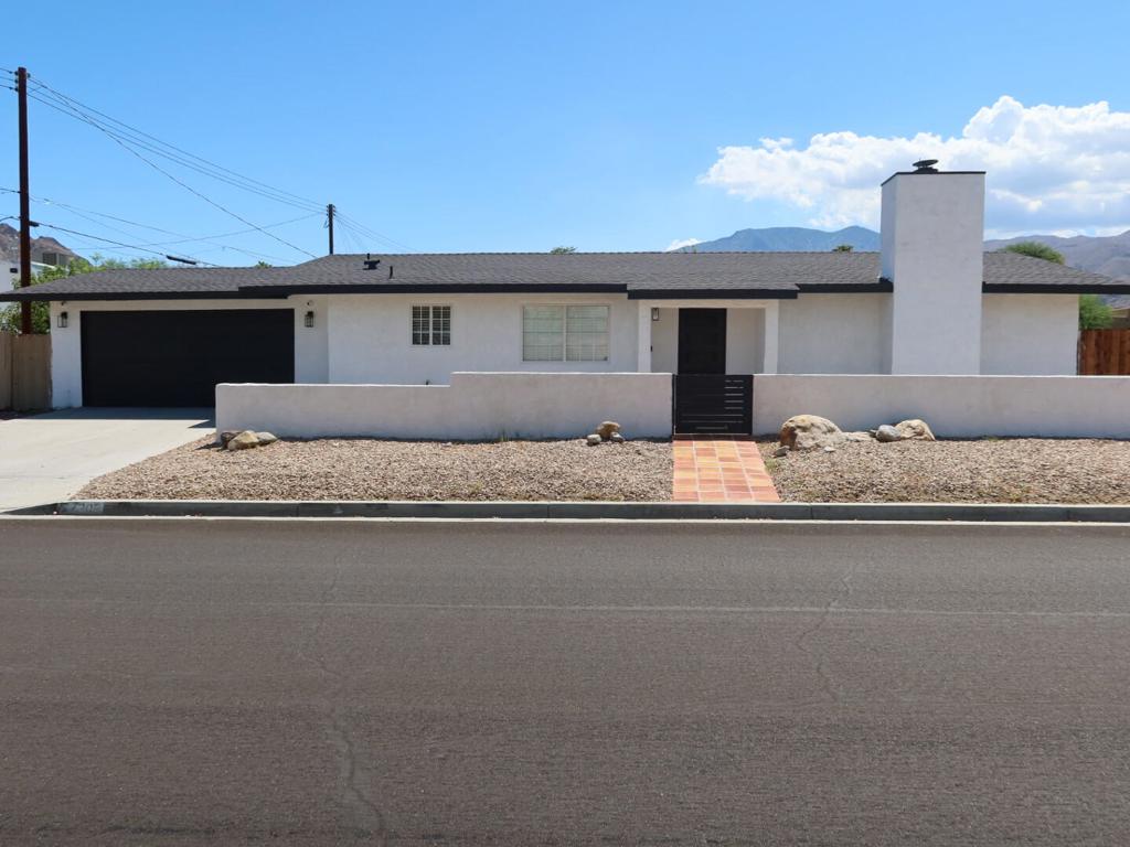 🏡 Completely Remodeled Desert Gem in the Coveted Coves of La Quinta!Welcome to 77305 Calle Colima -- a beautifully remodeled 3-bedroom, 2-bathroom home situated on a desirable corner lot in the serene and sought-after Coves of La Quinta. This property has been thoughtfully updated with over $25,000 in upgrades, making it truly move-in ready for the next lucky owner.As you enter through the new custom iron front door, you'll immediately notice the attention to detail throughout. The home features an open-concept layout filled with natural light, sleek hardwood flooring, recessed lighting, and a modern gourmet kitchen complete with marble countertops, stainless steel appliances, and stylish cabinetry--perfect for entertaining or quiet nights in.One of the most significant improvements is the brand-new HVAC system, including all-new ductwork--an essential and high-value upgrade for year-round comfort in the desert climate. A new layer of roof shingles has also been added, providing both enhanced durability and curb appeal.The spacious living areas flow seamlessly into the bedrooms and beautifully updated bathrooms, creating a harmonious living environment. The backyard offers a private and tranquil setting to relax, entertain, or enjoy the breathtaking mountain views that make La Quinta living so special.📍 Prime Location: Just minutes from the vibrant charm of Old Town La Quinta, where you'll find boutique shopping, top-rated restaurants, coffee shops, art galleries, and the popular weekly farmers market. Enjoy close proximity to hiking and biking trails such as Bear Creek Trail, world-class golf courses including The Tradition Golf Club and SilverRock, and local favorites like Civic Center Park and Fritz Burns Park with tennis, pickle-ball, and more.Whether you're seeking a stylish full-time residence, a seasonal desert getaway, or a high-performing investment property, this home offers the perfect blend of location, quality, and lifestyle.✨ Don't miss your chance to own a fully upgraded home in one of La Quinta's most desirable neighborhoods!