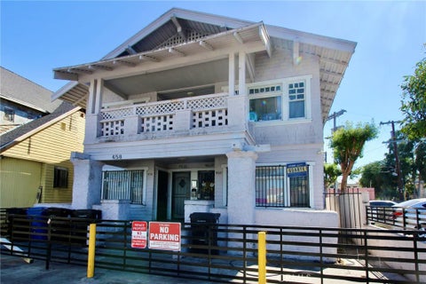 Photo of 458 W Vernon Avenue, Los Angeles, CA 90037 (MLS # PW26221051)