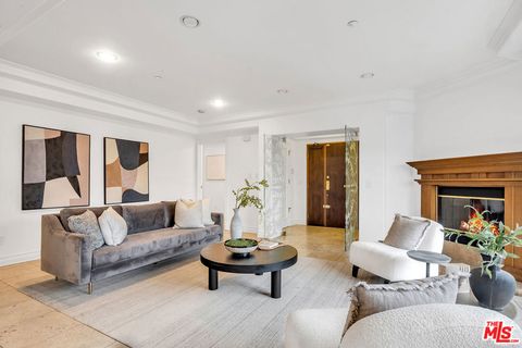 Photo of 871 GRANVILLE Avenue #301, Los Angeles, CA 90049 (MLS # 25612913)