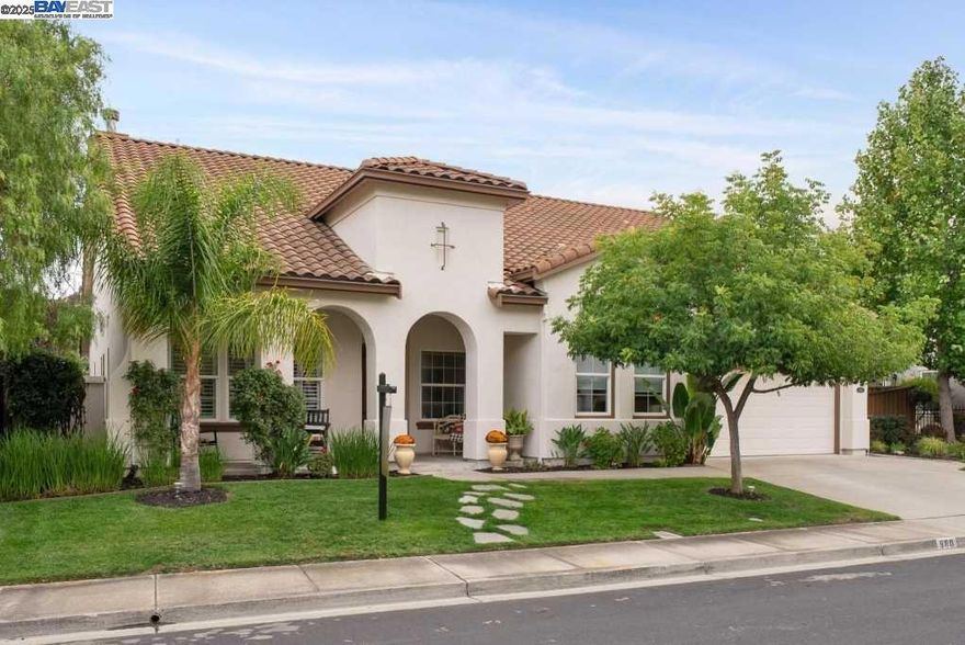 Beautifully designed home with a versatile layout for today’s lifestyle. The primary suite is located downstairs and includes a spacious retreat with fireplace, perfect as a sitting area, office, or quiet escape. A second downstairs bedroom with full bath provides an ideal multi generational living option, guest suite, or in-law quarters.  The main living areas flow easily with a welcoming family room, formal dining area, and light-filled kitchen that anchors the home—perfect for gathering and entertaining. Upstairs features two additional bedrooms plus a generous family/game room with built-in desk, creating a private wing for children or teens.  Set on a desirable court, the community offers an Olympic-sized pool, clubhouse, and neighborhood events, along with access to award-winning North-gate schools. Don’t miss the chance to make this home yours in time for the holidays—imagine hosting family and friends here this season and for years to come. Open House October 11 and 12 : 1 to 4 pm