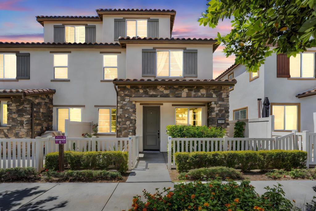 Welcome to your dream home in the heart of Otay Ranch with an assumable VA loan @ 5.75%! This beautifully upgraded and private Twinhome offers the perfect blend of space and functionality across three well-designed levels. The main floor is ideal for entertaining, featuring a bright and open-concept kitchen, dining, and family room, along with a powder room. On the second level, you’ll find a spacious primary suite, two generously sized guest bedrooms with a shared full bath, and a laundry room for easy everyday living. The third floor is a versatile retreat - perfect for guests, extended family, or a home office - with its own bedroom, full bathroom, and an open loft that could easily serve as a fifth bedroom, playroom, or media space. Enjoy the privacy of your own yard, an attached 2-car garage, and ample guest parking nearby. As a Twinhome, you benefit from only one shared wall and full land ownership - a rare combination. All this comes with low HOA fees that cover pest control, trash service (including large bin emptying), common area walkway and landscape maintenance, annual tree trimming, and more. Don’t miss this incredible opportunity to live in one of Chula Vista’s most desirable communities - close to top-rated schools, parks, shopping, and dining. Ideally located with easy access to HW-125 and I-805, this home offers unbeatable convenience for commuters and families alike. The community features resort-style amenities, including two sparkling pools, a relaxing spa, a fitness center, an event room, and a barbecue-equipped play area. Families will appreciate being only a 5-minute walk from top-rated schools, Muraoka Elementary and Olympian High School.