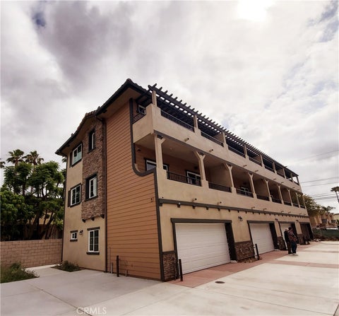 Photo of 10341 Western Ave. Ave #5, Downey, CA 90241 (MLS # WS26226839)