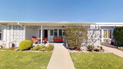 Photo of 13721 Alderwood Lane Ln #28 E M3, Seal Beach, CA 90740 (MLS # RS26035960)