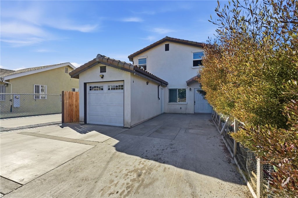 Photo of 9577 Maie AVE, Los Angeles, CA 90002 (MLS # DW26192570)