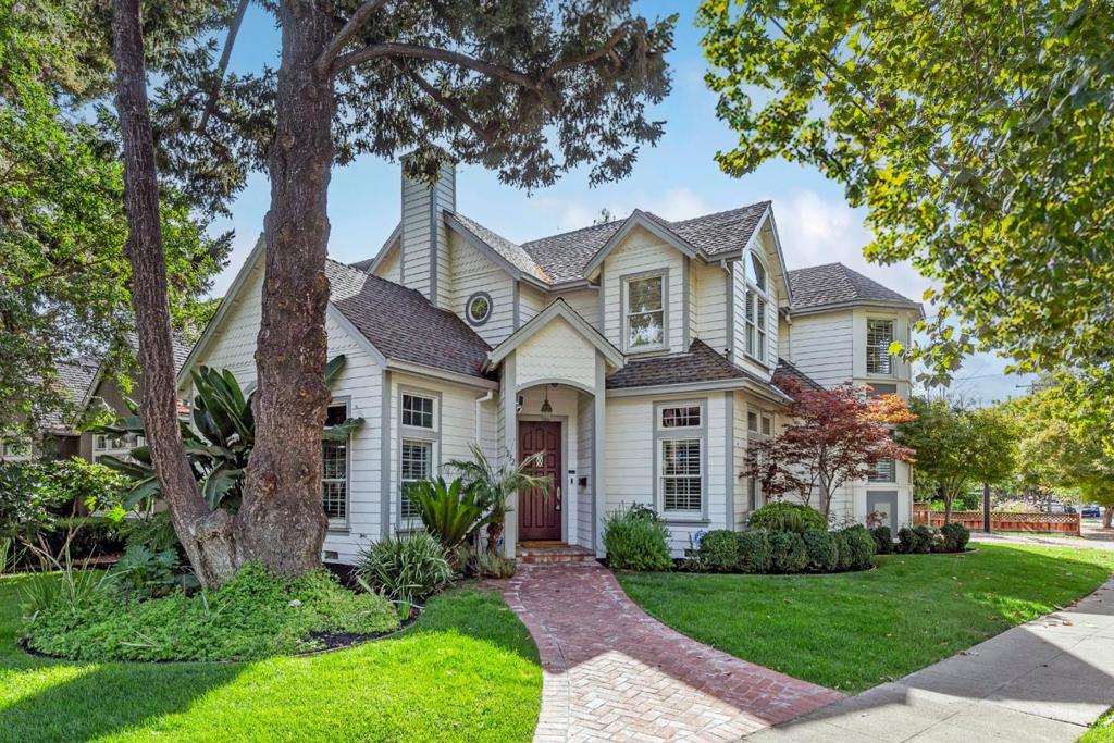 Nestled in the heart of Willow Glen, located one block from downtown! This charming two-story residence boasts 2,700 square feet of living space. Built in 2001, this home blends modern comforts with timeless style. As you enter, you'll be greeted by the formal living room with a vaulted ceiling and separate dining room, perfect for entertaining. From there you'll enter the heart of this home. The spacious kitchen features a center island, JennAir double stainless-steel ovens, Zephyr cooktop, counter depth refrigerator, double wine refrigerators, and a walk-in pantry - providing ample storage. Its a chef's delight! The kitchen opens up to the family room, featuring a cozy gas fireplace and built-in speakers, refinished hardwood floors, with doors opening to the landscaped backyard. This outdoor space invites you to enjoy a brick patio, perfect for an evening barbeque with friends and family. The yard has artificial turf. Upstairs you'll find four generously sized bedrooms, offering plenty of space for relaxation and privacy. The primary suite is a true retreat with its en-suite bathroom, featuring dual vanities and a luxurious jetted tub and separate shower. There's also a walk-in closet by California Closets. The garage offers ample storage and a Tesla car charger!