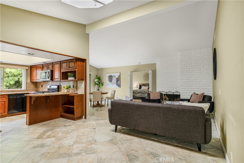 Welcome to 472 Plaza Estival, San Clemente — where location and lifestyle come together!
This rare single-level end-unit offers the privacy of a corner property with hardly any common walls, making it feel more like a detached home, Step inside to a spacious living room drenched in natural light, where vaulted ceilings and open flow create the perfect setting for gatherings or quiet evenings at home.
The modern kitchen is beautifully updated with contemporary finishes, providing the ideal space for cooking and connection. Each room feels expansive, airy, and inviting—designed to make everyday living feel effortless.
The primary suite features an en-suite bath and a walk-in closet, adding to the luxurious lifestyle. With 3 spacious bedrooms and 2 private patios, this home is perfect for entertaining or creating your own private oasis.
Additional highlights include an attached 2-car garage with laundry and extra storage. With its open layout and airy single-level design, the property delivers comfort and ease of living at its finest.
The community enhances your experience with a resort-style pool and spa and a tennis/pickleball/basketball court with walkable trails all within a secure gated setting. Ideally situated in a prime San Clemente location, you’ll love being just moments from lush green parks, world-famous beaches, award-winning schools, dining, and shopping. Whether it’s a morning surf session, a stroll to nearby cafés, or an afternoon at the park, everything you need is just around the corner.
This home is a rare find—blending privacy, convenience, and the very best of coastal living.