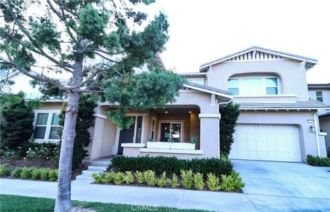 Photo of 73 Cartwheel, Irvine, CA 92618 (MLS # WS25253954)
